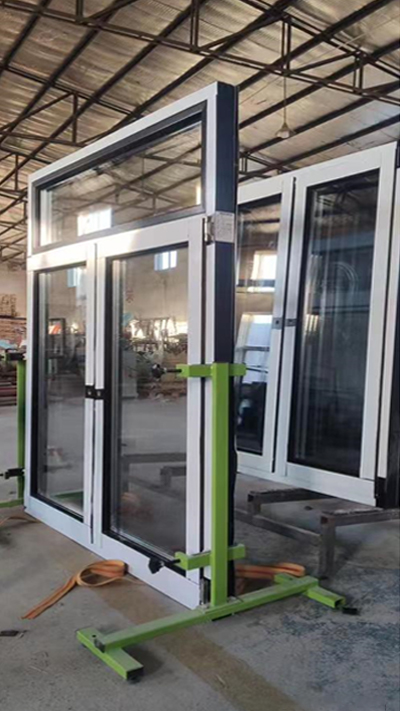 Aluminum clad wood window being checked before shipment for New York project